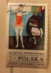 Woman handing up laundry, by Andrzej Wroblewski
