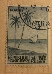 Palm trees and sailing ship